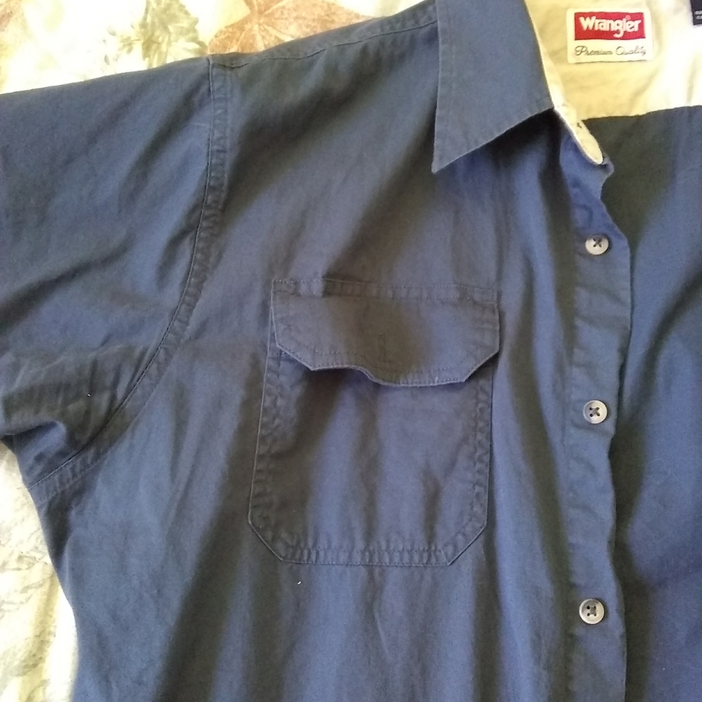 Grey Wrangler button down shirt sleeve